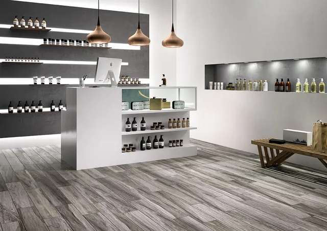 Artistica_Plus_Grey-15x90_01-Ambiente-Commerciale_Definitivo-01